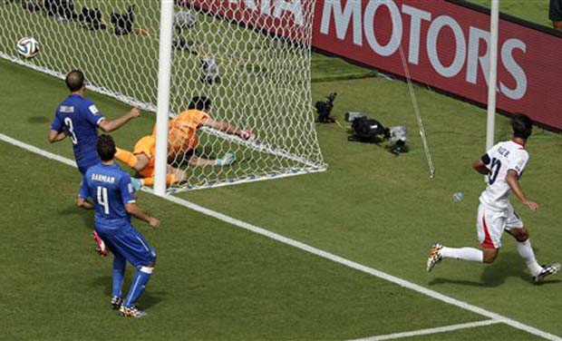 Costa Rica's Bryan Ruiz, right, scores the opening goal past Italy's goalkeeper Gianluigi Buffon (Photo: AP) Costa Rica's Bryan Ruiz, right, scores the opening goal past Italy's goalkeeper Gianluigi Buffon (Photo: AP)